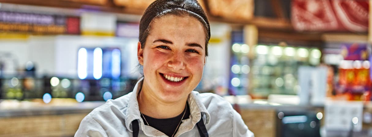 An image of a woman working in a sobeys store.