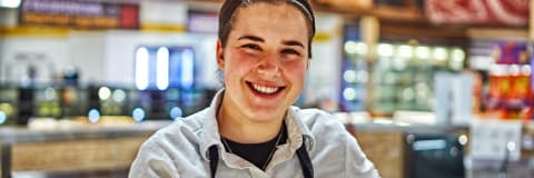 An image of a woman working in a sobeys store.